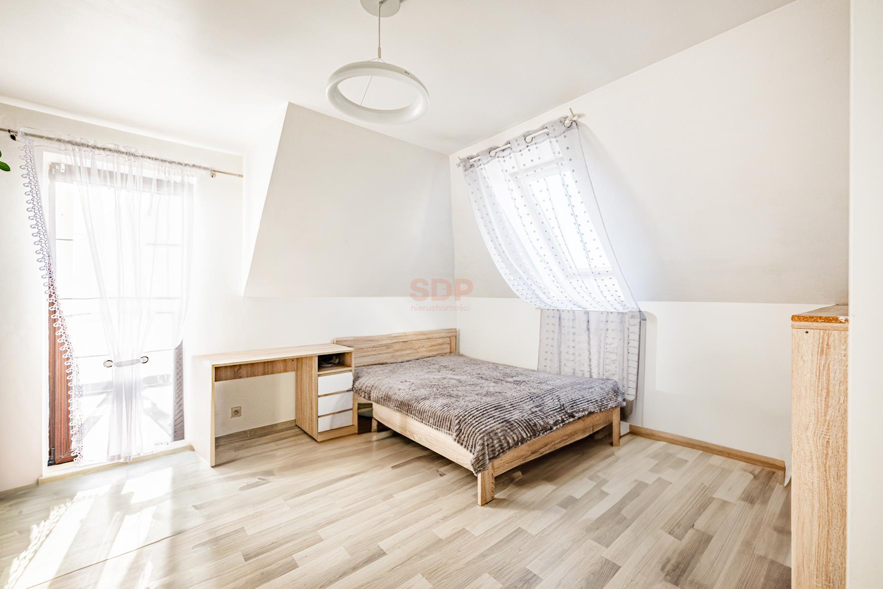 Dom z gruntową pompą ciepła i fotowoltaiką-11
